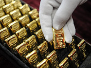 Цена на золото по итогам вечернего межбанковского фиксинга в Лондоне в четверг повысилась