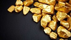 Цена на золото по итогам вечернего межбанковского фиксинга в Лондоне в пятницу повысилась