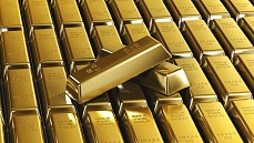 Цена на золото по итогам вечернего межбанковского фиксинга в Лондоне в понедельник понизилась