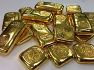 Цена на золото по итогам вечернего межбанковского фиксинга в Лондоне в понедельник понизилась